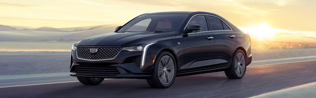 2025 Cadillac CT4 driving on a desert road