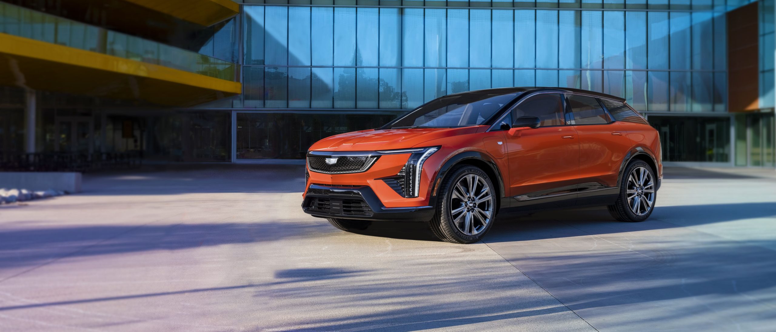 2025 Cadillac OPTIQ parked in front of building