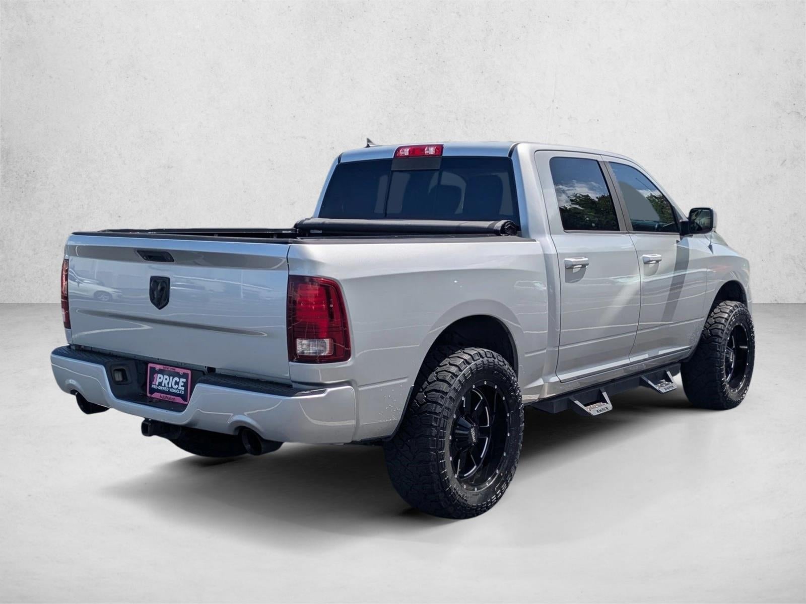 2014 RAM 1500 4WD Crew Cab 5.7 Ft Box Sport