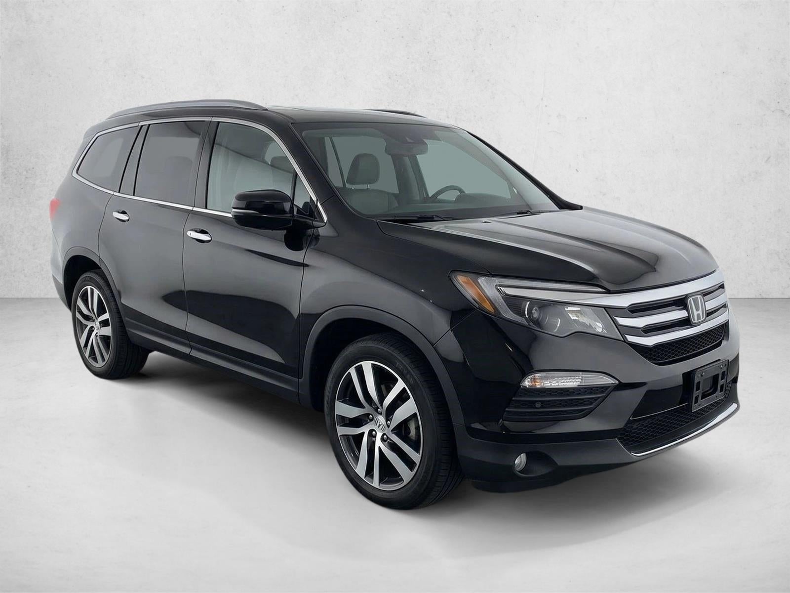 2016 Honda Pilot AWD Touring with DVD Rear Entertainment System and Navigation