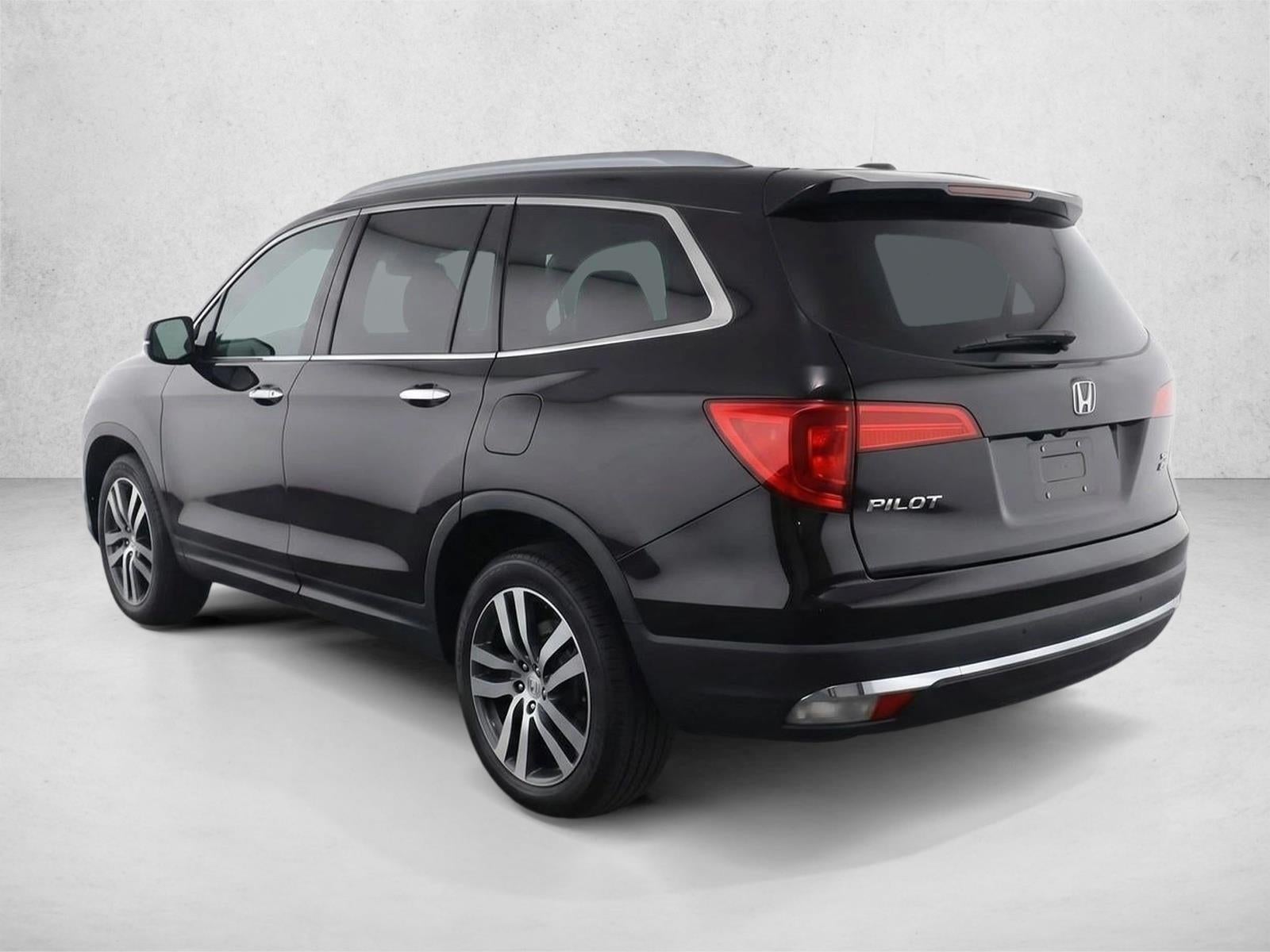 2016 Honda Pilot AWD Touring with DVD Rear Entertainment System and Navigation
