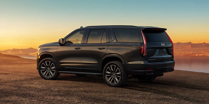 Escalade showcasing its rear view with bold and rugged features